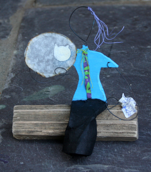 woman and cat sculpture